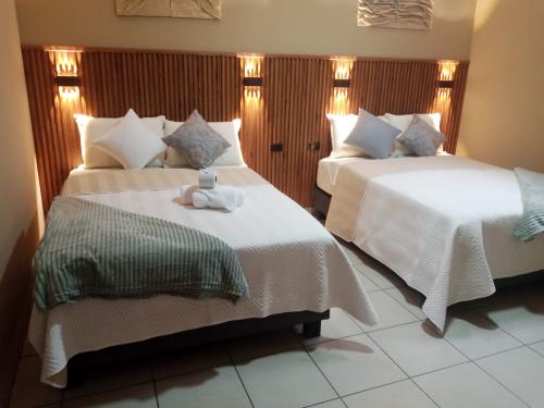 2 Camas matrimoniales